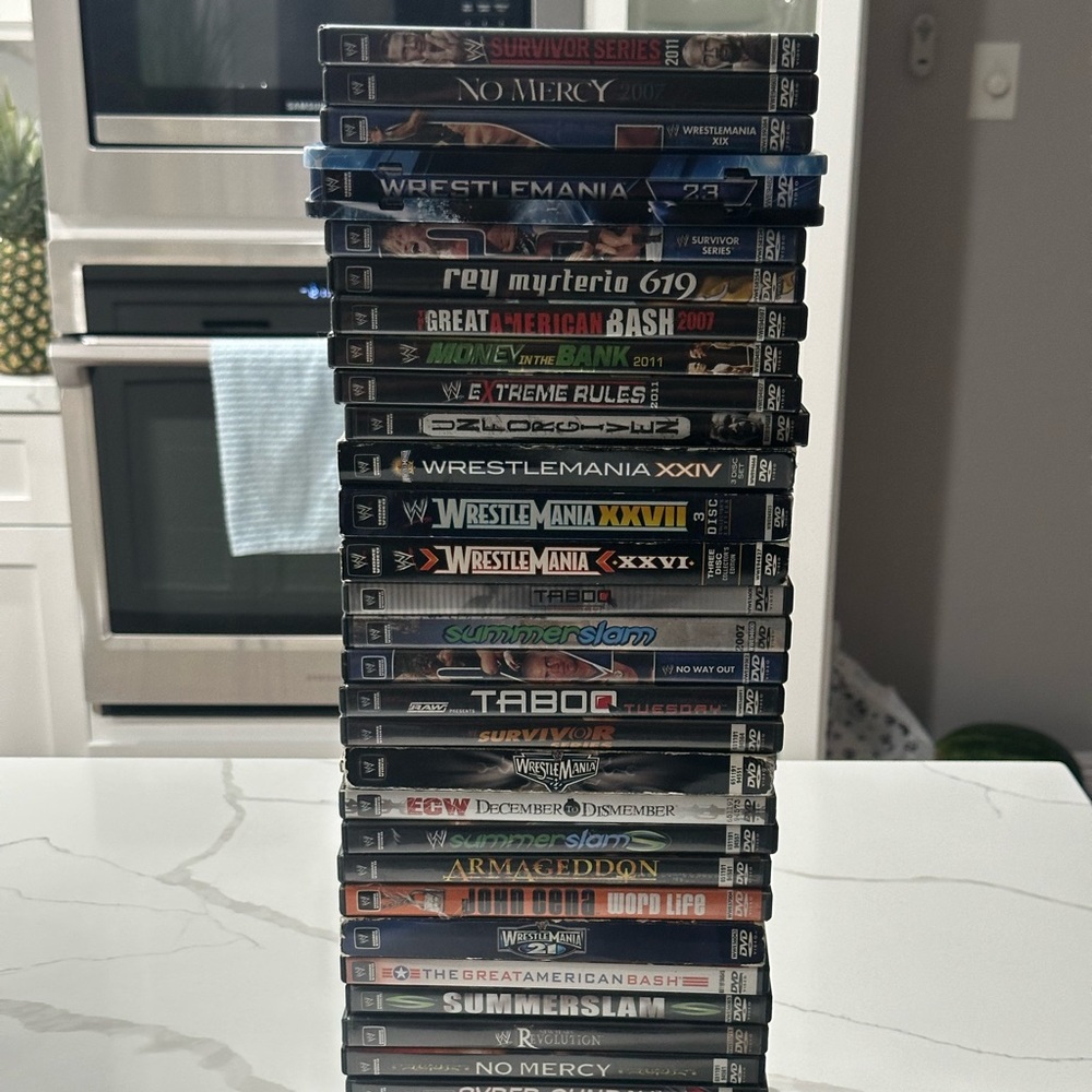 WWE DVD MOVIE LOT PICK AND CHOOSE. BUY 3 AND GET A RANDOM WWE MOVIE FOR FREE